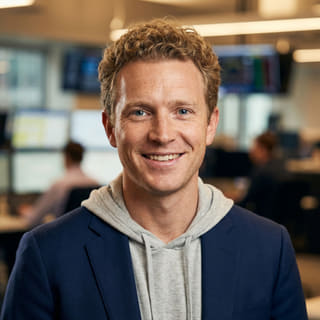 Foto del profilo di Ryan Brooks, presentato come Lead Trading Analyst di Mercantezza